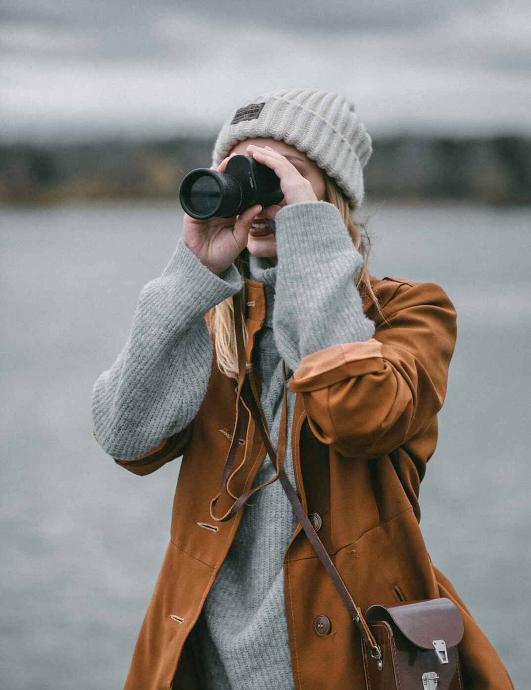 private investigator with binoculars