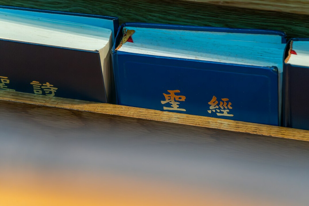 Stack of official documents and a pen on a desk