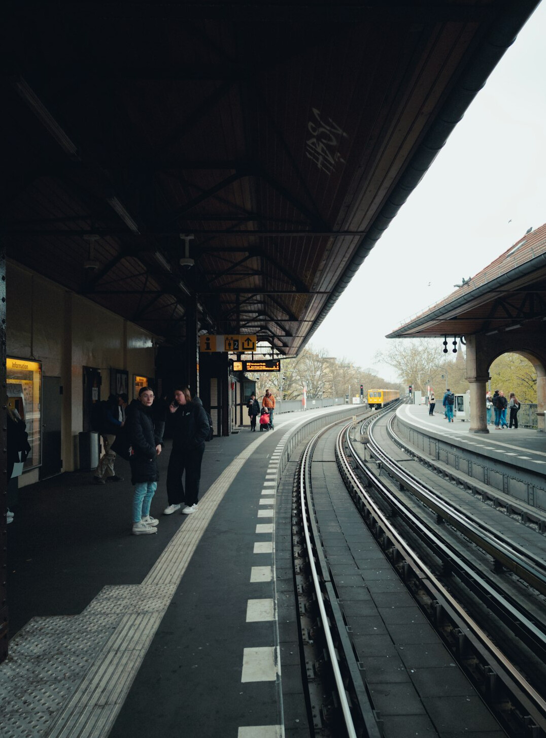 Passengers waiting on a train platform