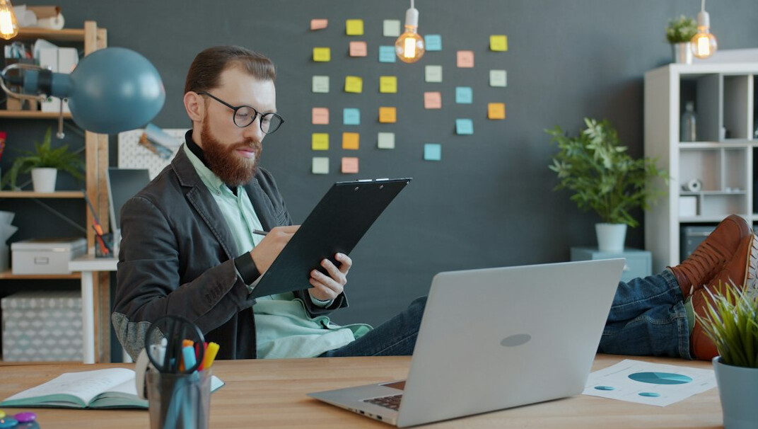 man reviewing documents in office