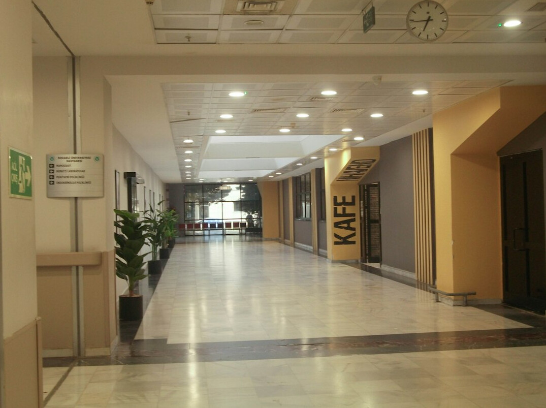 Empty hospital corridor with waiting chairs